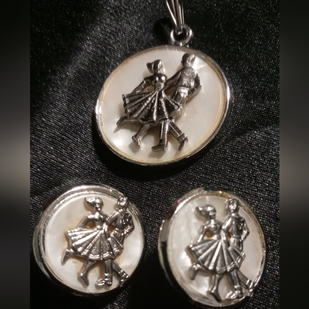 Vintage 1950's shadow box dancers clip on earrings & pendant on mother of pearl.